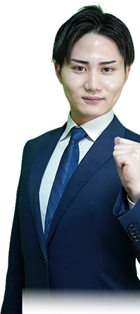 ガッツポーズをする講師